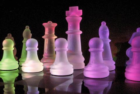 Colorful glass chess pieces