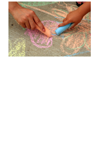 Adult hand drawing with pink chalk and child's hand drawing with blue chalk on sidewalk