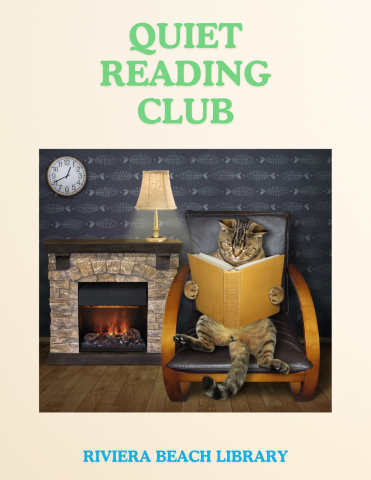 Cat reading a book while sitting in a chair, next to a fireplace with a lamp on top. 